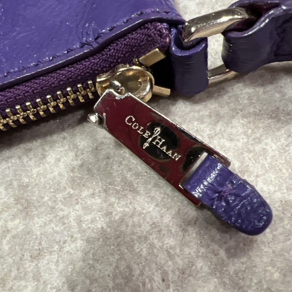 COLE HAAN Jitney II Ziptop Swingpack Crossbody Bag Purple Patent Leather - Picture 7 of 11